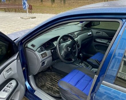 Синій Міцубісі Lancer, об'ємом двигуна 1.3 л та пробігом 225 тис. км за 4700 $, фото 3 на Automoto.ua