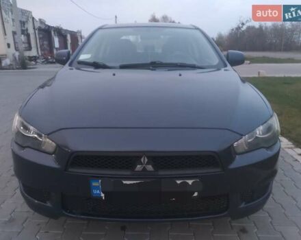 Синий Мицубиси Лансер, объемом двигателя 1.5 л и пробегом 260 тыс. км за 5000 $, фото 3 на Automoto.ua