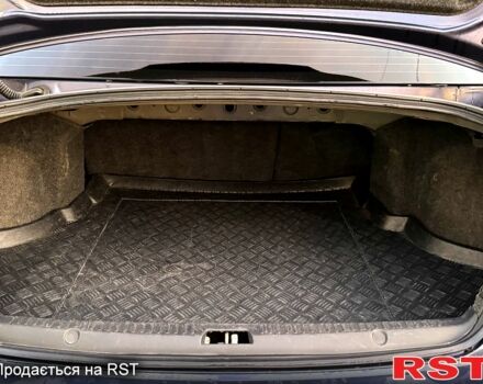 Синий Мицубиси Лансер, объемом двигателя 2 л и пробегом 189 тыс. км за 7350 $, фото 4 на Automoto.ua