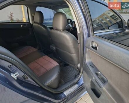 Синій Міцубісі Lancer, об'ємом двигуна 2 л та пробігом 234 тис. км за 6700 $, фото 15 на Automoto.ua