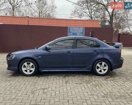 Синій Міцубісі Lancer, об'ємом двигуна 2 л та пробігом 210 тис. км за 6800 $, фото 15 на Automoto.ua