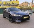 Синій Міцубісі Lancer, об'ємом двигуна 2 л та пробігом 189 тис. км за 7350 $, фото 1 на Automoto.ua