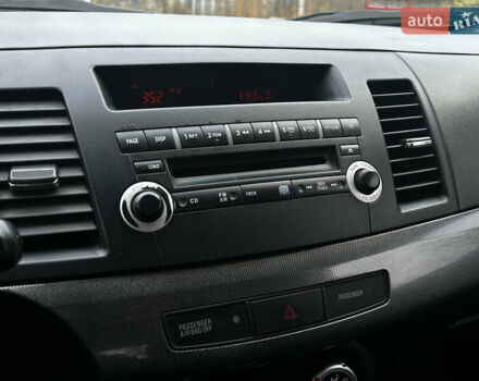 Синій Міцубісі Lancer, об'ємом двигуна 2 л та пробігом 222 тис. км за 5999 $, фото 10 на Automoto.ua