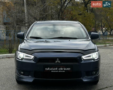 Синій Міцубісі Lancer, об'ємом двигуна 2 л та пробігом 222 тис. км за 5999 $, фото 7 на Automoto.ua