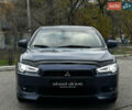 Синій Міцубісі Lancer, об'ємом двигуна 2 л та пробігом 222 тис. км за 5999 $, фото 7 на Automoto.ua