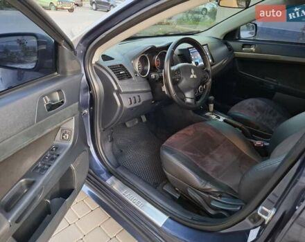 Синій Міцубісі Lancer, об'ємом двигуна 2 л та пробігом 234 тис. км за 6700 $, фото 16 на Automoto.ua