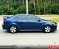 Синій Міцубісі Lancer, об'ємом двигуна 2 л та пробігом 170 тис. км за 7500 $, фото 6 на Automoto.ua