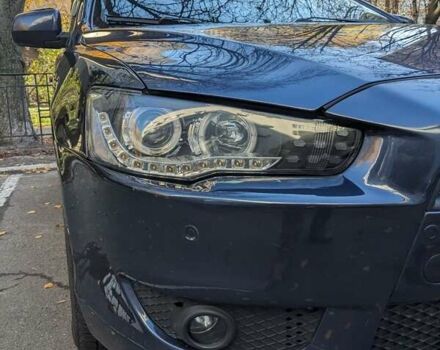 Синий Мицубиси Лансер, объемом двигателя 2 л и пробегом 300 тыс. км за 6250 $, фото 13 на Automoto.ua