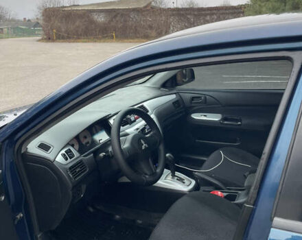 Синий Мицубиси Лансер, объемом двигателя 1.6 л и пробегом 185 тыс. км за 4950 $, фото 18 на Automoto.ua