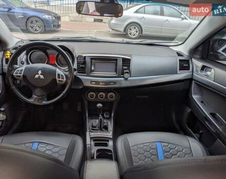 Синий Мицубиси Лансер, объемом двигателя 2 л и пробегом 300 тыс. км за 6250 $, фото 11 на Automoto.ua