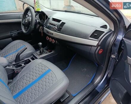 Синий Мицубиси Лансер, объемом двигателя 1.5 л и пробегом 211 тыс. км за 5222 $, фото 28 на Automoto.ua