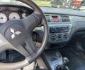 Синий Мицубиси Лансер, объемом двигателя 1.6 л и пробегом 187 тыс. км за 5000 $, фото 10 на Automoto.ua