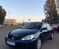Синий Мицубиси Лансер, объемом двигателя 1.6 л и пробегом 150 тыс. км за 5999 $, фото 1 на Automoto.ua