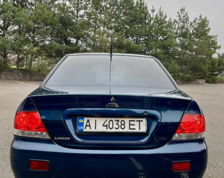 Синий Мицубиси Лансер, объемом двигателя 1.6 л и пробегом 184 тыс. км за 4950 $, фото 11 на Automoto.ua