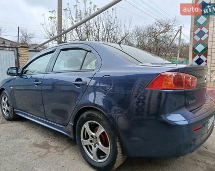 Синий Мицубиси Лансер, объемом двигателя 1.5 л и пробегом 211 тыс. км за 5222 $, фото 12 на Automoto.ua