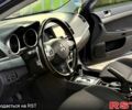 Синій Міцубісі Lancer, об'ємом двигуна 2 л та пробігом 230 тис. км за 7799 $, фото 6 на Automoto.ua