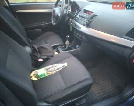 Синий Мицубиси Лансер, объемом двигателя 1.5 л и пробегом 260 тыс. км за 5000 $, фото 16 на Automoto.ua