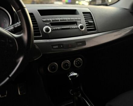 Синій Міцубісі Lancer, об'ємом двигуна 2 л та пробігом 189 тис. км за 7350 $, фото 12 на Automoto.ua