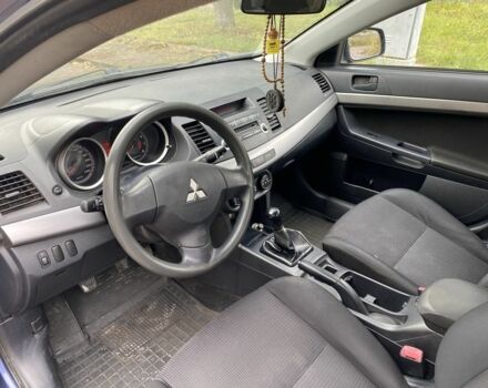 Синий Мицубиси Лансер, объемом двигателя 1.5 л и пробегом 267 тыс. км за 4900 $, фото 4 на Automoto.ua