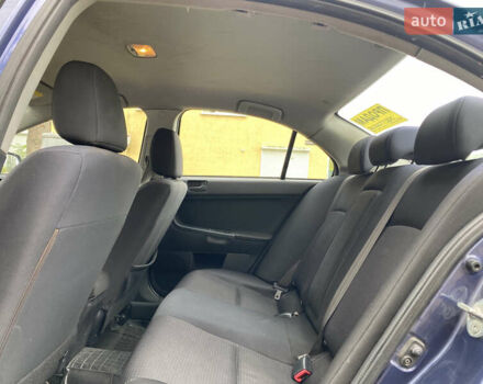 Синій Міцубісі Lancer, об'ємом двигуна 1.5 л та пробігом 271 тис. км за 4900 $, фото 12 на Automoto.ua