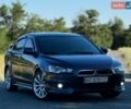 Синий Мицубиси Лансер, объемом двигателя 2 л и пробегом 255 тыс. км за 6999 $, фото 1 на Automoto.ua