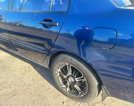 Синій Міцубісі Lancer, об'ємом двигуна 1 л та пробігом 111 тис. км за 3100 $, фото 2 на Automoto.ua