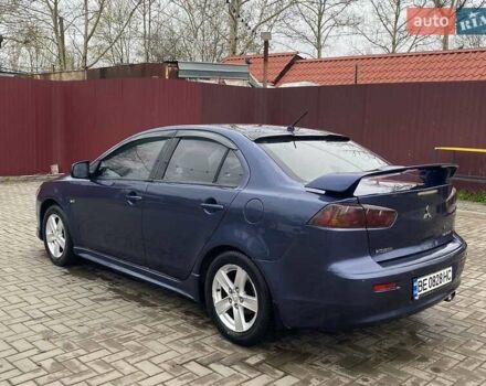 Синій Міцубісі Lancer, об'ємом двигуна 2 л та пробігом 210 тис. км за 6800 $, фото 14 на Automoto.ua