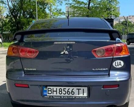 Синій Міцубісі Lancer, об'ємом двигуна 2 л та пробігом 226 тис. км за 6700 $, фото 5 на Automoto.ua