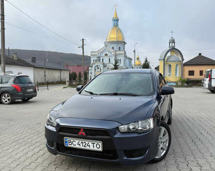 Синий Мицубиси Лансер, объемом двигателя 2 л и пробегом 326 тыс. км за 5650 $, фото 2 на Automoto.ua