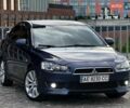 Синий Мицубиси Лансер, объемом двигателя 2 л и пробегом 255 тыс. км за 7799 $, фото 1 на Automoto.ua