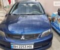 Синій Міцубісі Lancer, об'ємом двигуна 2 л та пробігом 228 тис. км за 2450 $, фото 1 на Automoto.ua