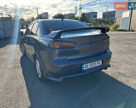 Синій Міцубісі Lancer, об'ємом двигуна 2 л та пробігом 240 тис. км за 6800 $, фото 2 на Automoto.ua