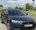 Синий Мицубиси Лансер, объемом двигателя 1.5 л и пробегом 180 тыс. км за 5299 $, фото 1 на Automoto.ua