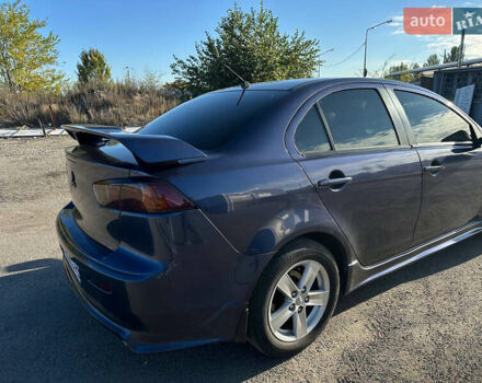 Синій Міцубісі Lancer, об'ємом двигуна 2 л та пробігом 240 тис. км за 6800 $, фото 1 на Automoto.ua