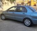 Синій Міцубісі Lancer, об'ємом двигуна 1.6 л та пробігом 275 тис. км за 4200 $, фото 1 на Automoto.ua