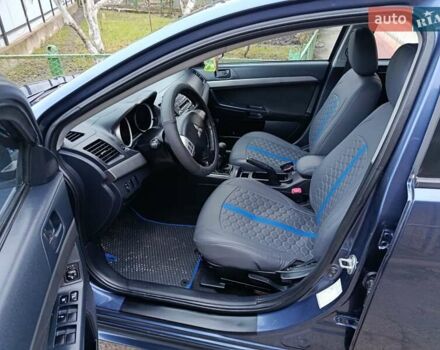 Синий Мицубиси Лансер, объемом двигателя 1.5 л и пробегом 211 тыс. км за 5222 $, фото 20 на Automoto.ua