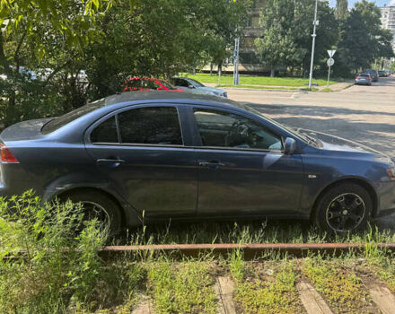 Синий Мицубиси Лансер, объемом двигателя 1.47 л и пробегом 250 тыс. км за 4500 $, фото 6 на Automoto.ua