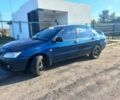 Синій Міцубісі Lancer, об'ємом двигуна 1 л та пробігом 111 тис. км за 3100 $, фото 1 на Automoto.ua