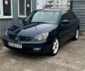 Синій Міцубісі Lancer, об'ємом двигуна 2 л та пробігом 222 тис. км за 3999 $, фото 1 на Automoto.ua