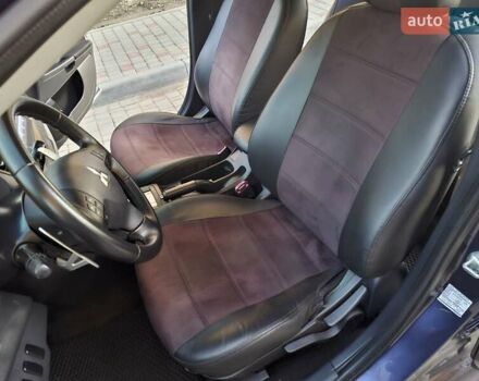 Синій Міцубісі Lancer, об'ємом двигуна 2 л та пробігом 234 тис. км за 6700 $, фото 14 на Automoto.ua