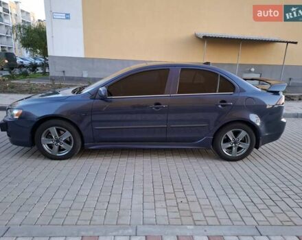 Синій Міцубісі Lancer, об'ємом двигуна 2 л та пробігом 234 тис. км за 6700 $, фото 8 на Automoto.ua