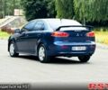Синій Міцубісі Lancer, об'ємом двигуна 2 л та пробігом 170 тис. км за 7500 $, фото 3 на Automoto.ua