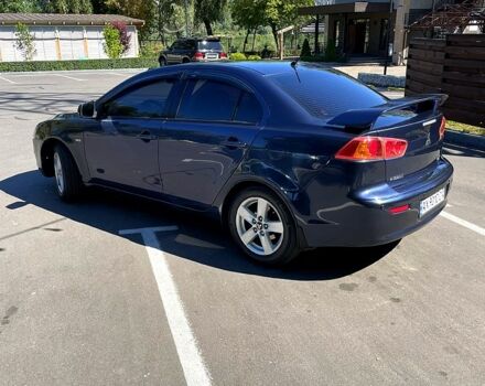 Синій Міцубісі Lancer, об'ємом двигуна 2 л та пробігом 300 тис. км за 5850 $, фото 2 на Automoto.ua
