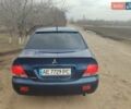 Синий Мицубиси Лансер, объемом двигателя 1.6 л и пробегом 156 тыс. км за 5500 $, фото 1 на Automoto.ua