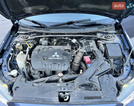 Синій Міцубісі Lancer, об'ємом двигуна 2 л та пробігом 282 тис. км за 6700 $, фото 30 на Automoto.ua