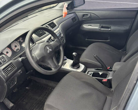 Синий Мицубиси Лансер, объемом двигателя 1.6 л и пробегом 238 тыс. км за 3500 $, фото 6 на Automoto.ua