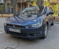 Синий Мицубиси Лансер, объемом двигателя 2 л и пробегом 300 тыс. км за 6250 $, фото 1 на Automoto.ua