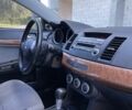 Синій Міцубісі Lancer, об'ємом двигуна 1.5 л та пробігом 198 тис. км за 4800 $, фото 12 на Automoto.ua