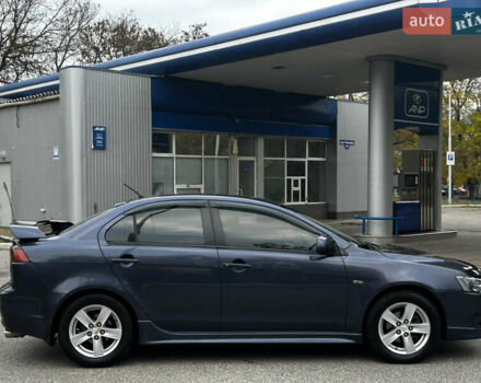 Синій Міцубісі Lancer, об'ємом двигуна 2 л та пробігом 222 тис. км за 5999 $, фото 1 на Automoto.ua