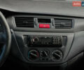 Синій Міцубісі Lancer, об'ємом двигуна 1.58 л та пробігом 224 тис. км за 3999 $, фото 12 на Automoto.ua